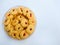 Cookies in a bowl. Sagu keju or kue sago or kue semprit keju with strawberry jam on top. Indonesian butter cookies.Â 